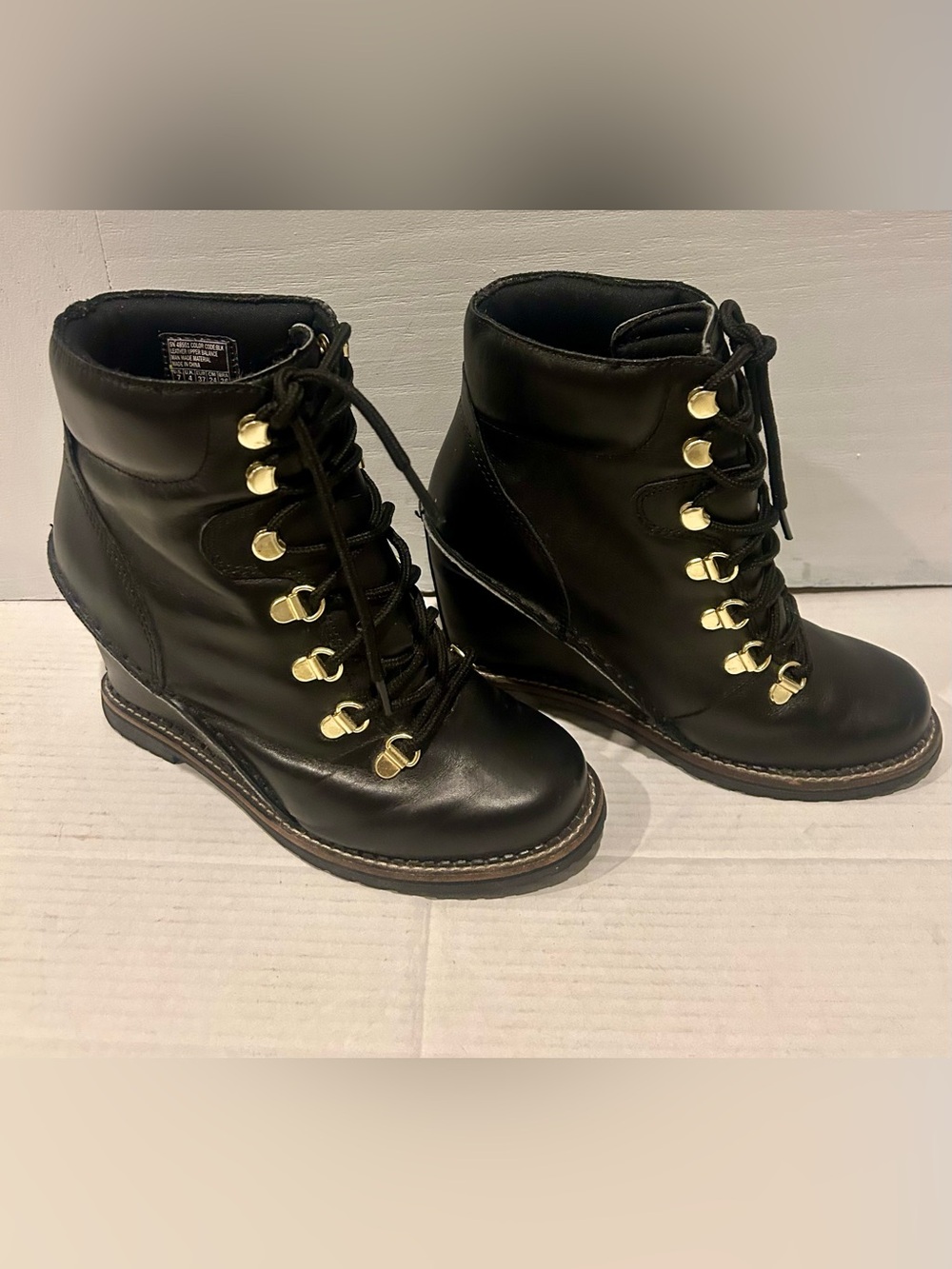 Skechers Black Lace-Up Wedge Ankle Boots with Gold Hardware